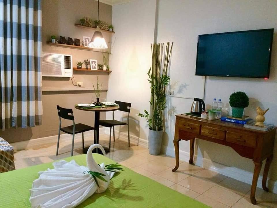 Vl Garden Suites Тагбиларан Экстерьер фото