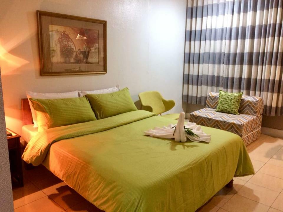 Vl Garden Suites Тагбиларан Экстерьер фото